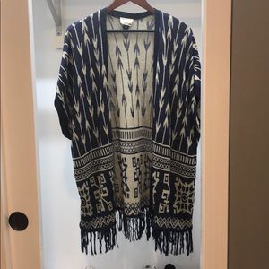 cardigan also known as a throw over